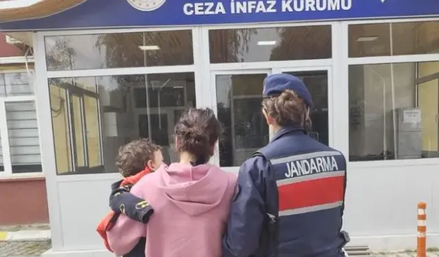 7 ayrı suçtan 20 yıl hapis cezasıyla aranıyordu: Kucağında bebeğiyle cezaevine girdi