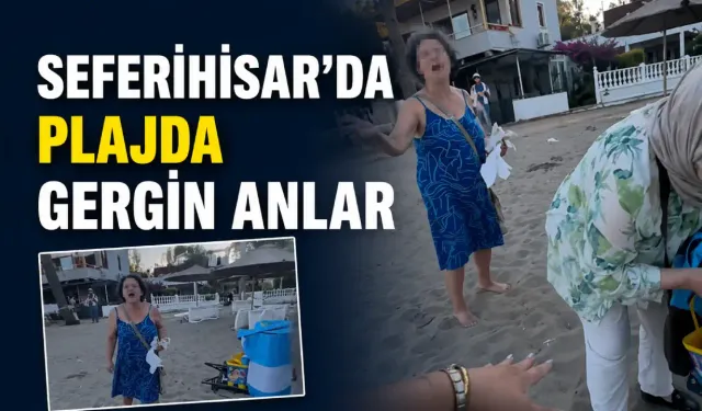Seferihisar’da plajda gergin anlar kameraya yansıdı: Sandalyeyi yere fırlattı